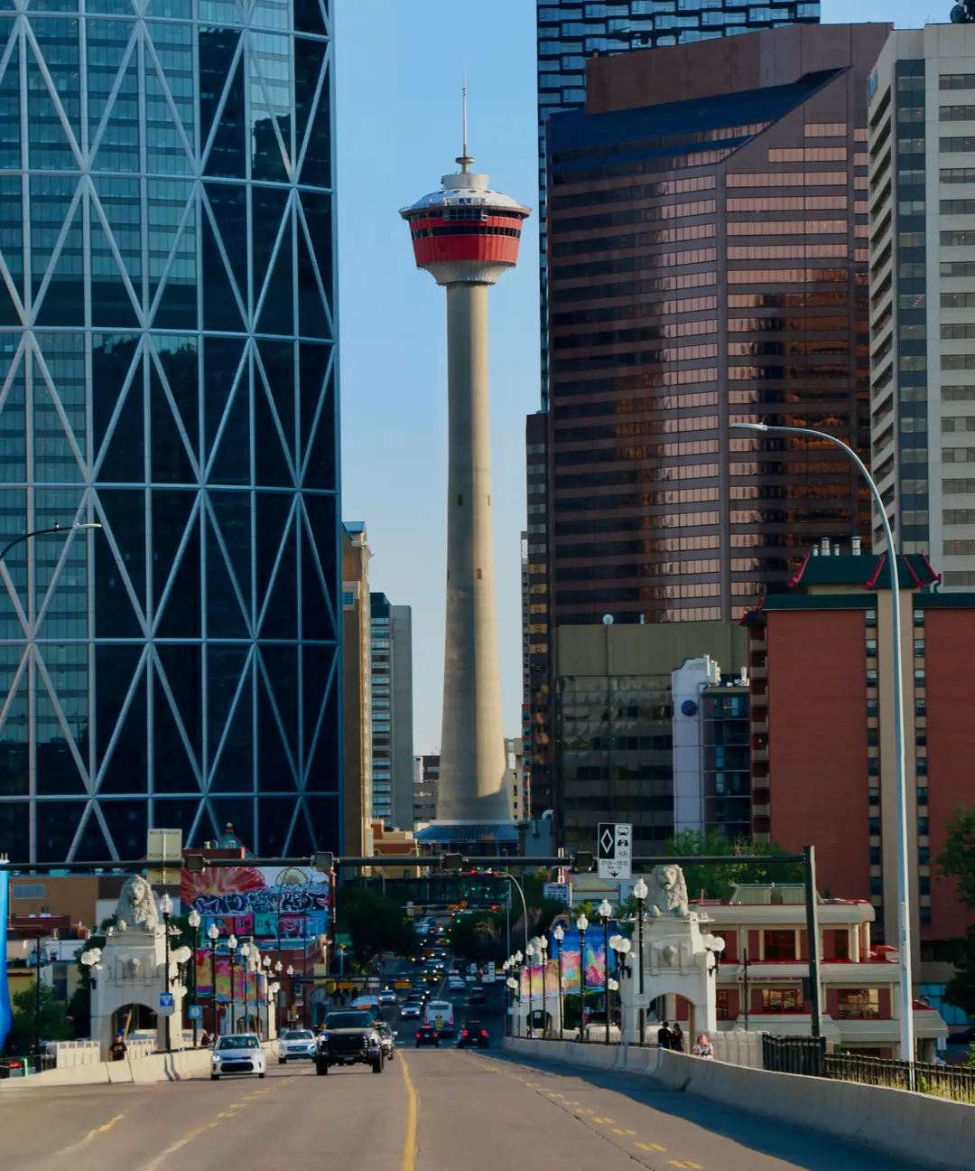 Calgary Tower at the end of a downtown street.