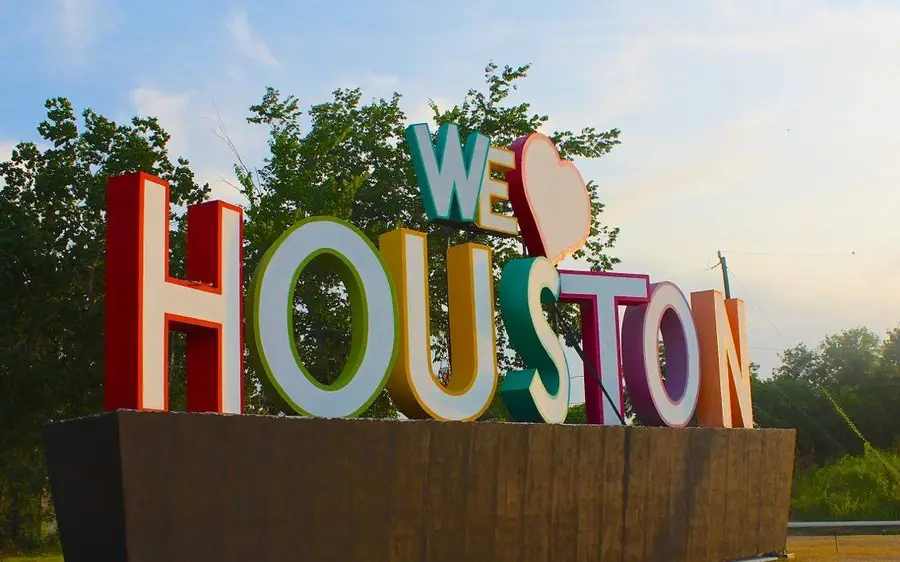 Colourful We Love Houston destination sign.